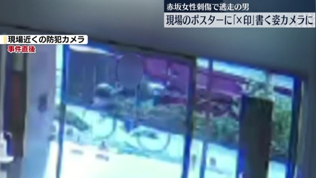 自転車で逃走する犯人