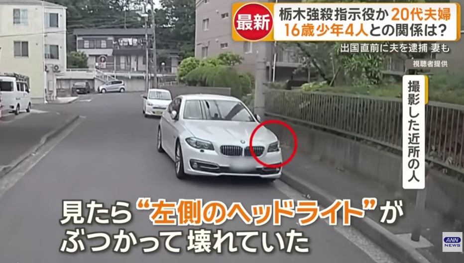 路上駐車された白いBMW

